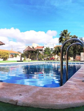 Cozy bungalow in Urb La Marina with shared pool